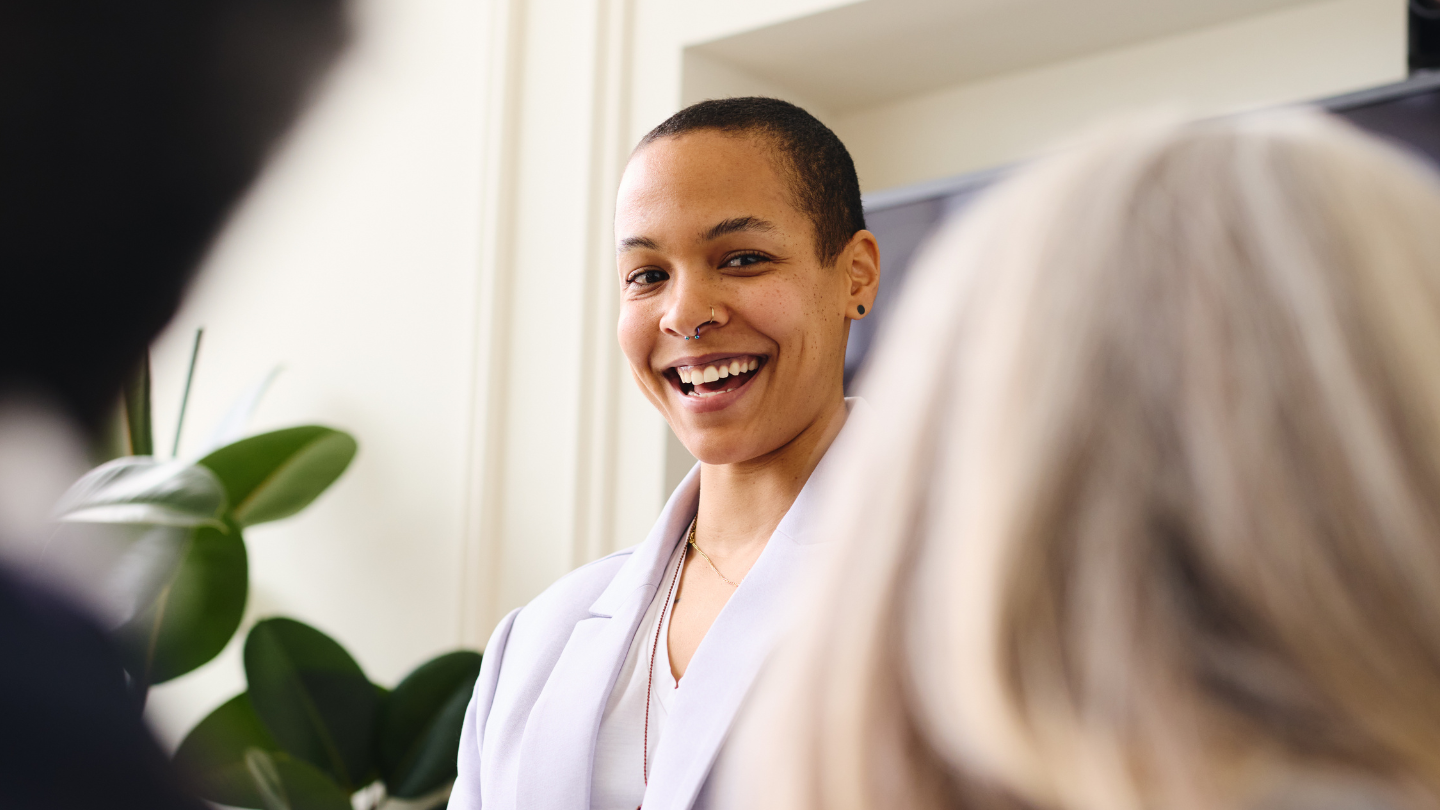 a person smiling at another